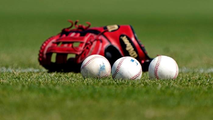 40 MLB players and staff members tested positive for COVID-19 in the past week, creating a "sense of urgency" in negotiations.